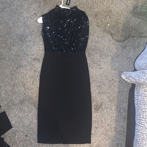 Beautiful black sequins dress new with tags has never been worn